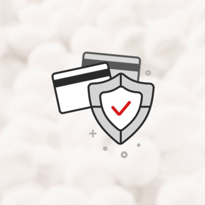 Two credit cards next to a gray shield with a red checkmark, symbolizing secure payment.